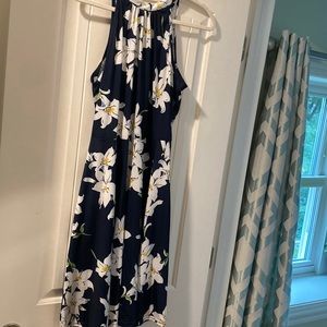 Navy dress with large white lily flowers, size large, high neck ties in the back